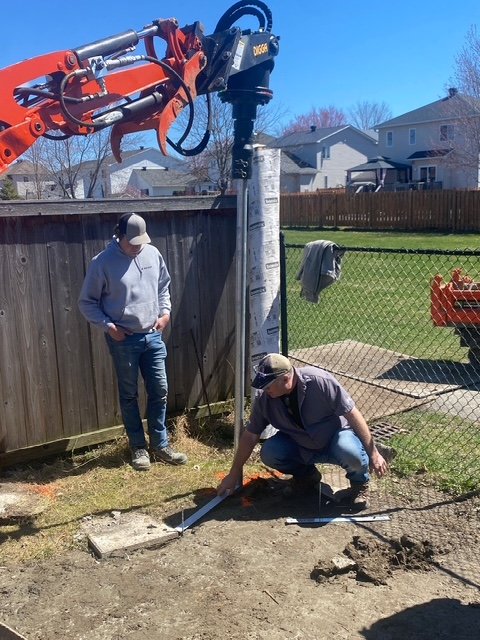 A&Z crew checking pile bracket alignment