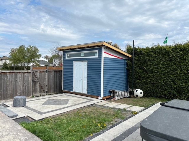 Completed shed on helical pile foundation